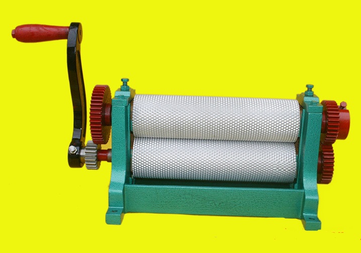 Manual beeswax embossing machine